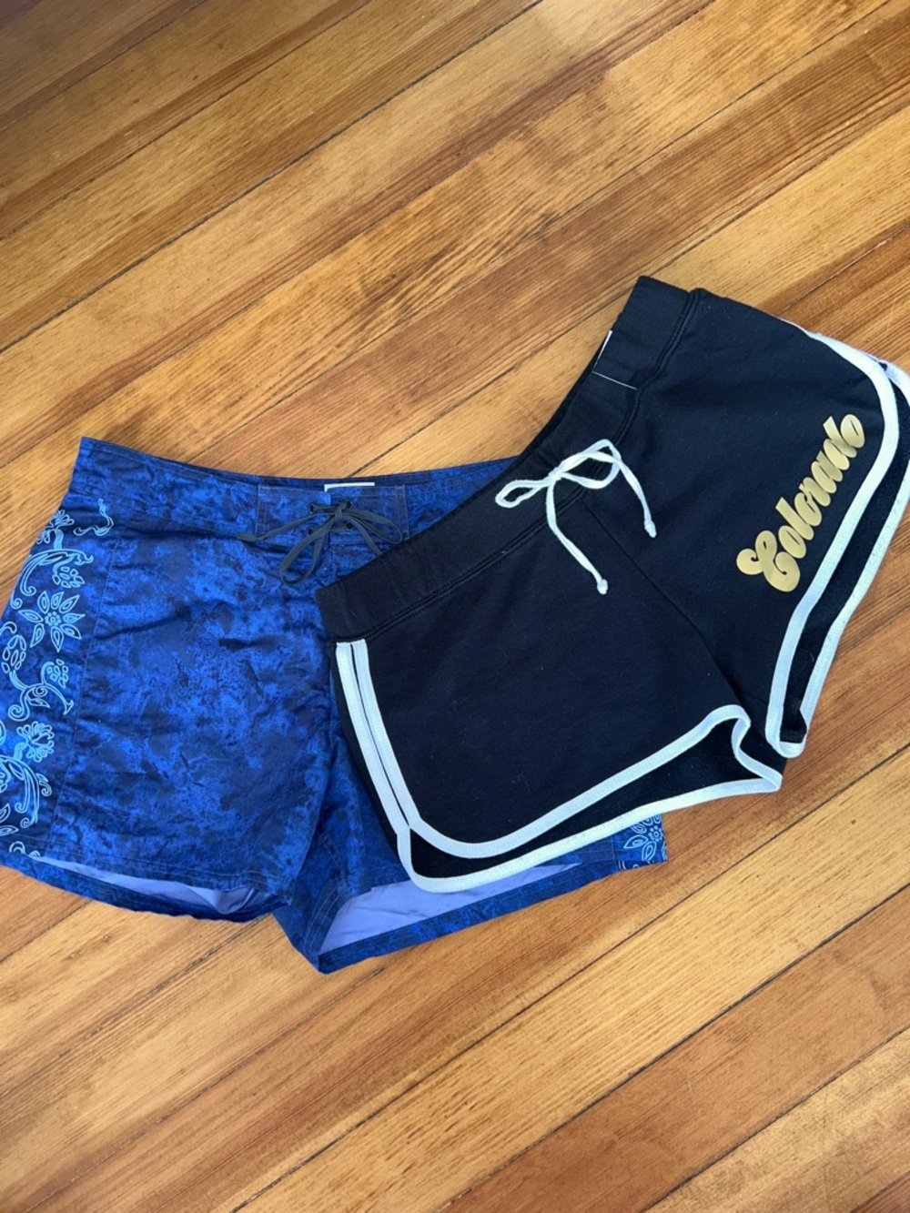 Black Colorado Shorts with White Trim and Blue Nike ACG Hawaiian Board shorts